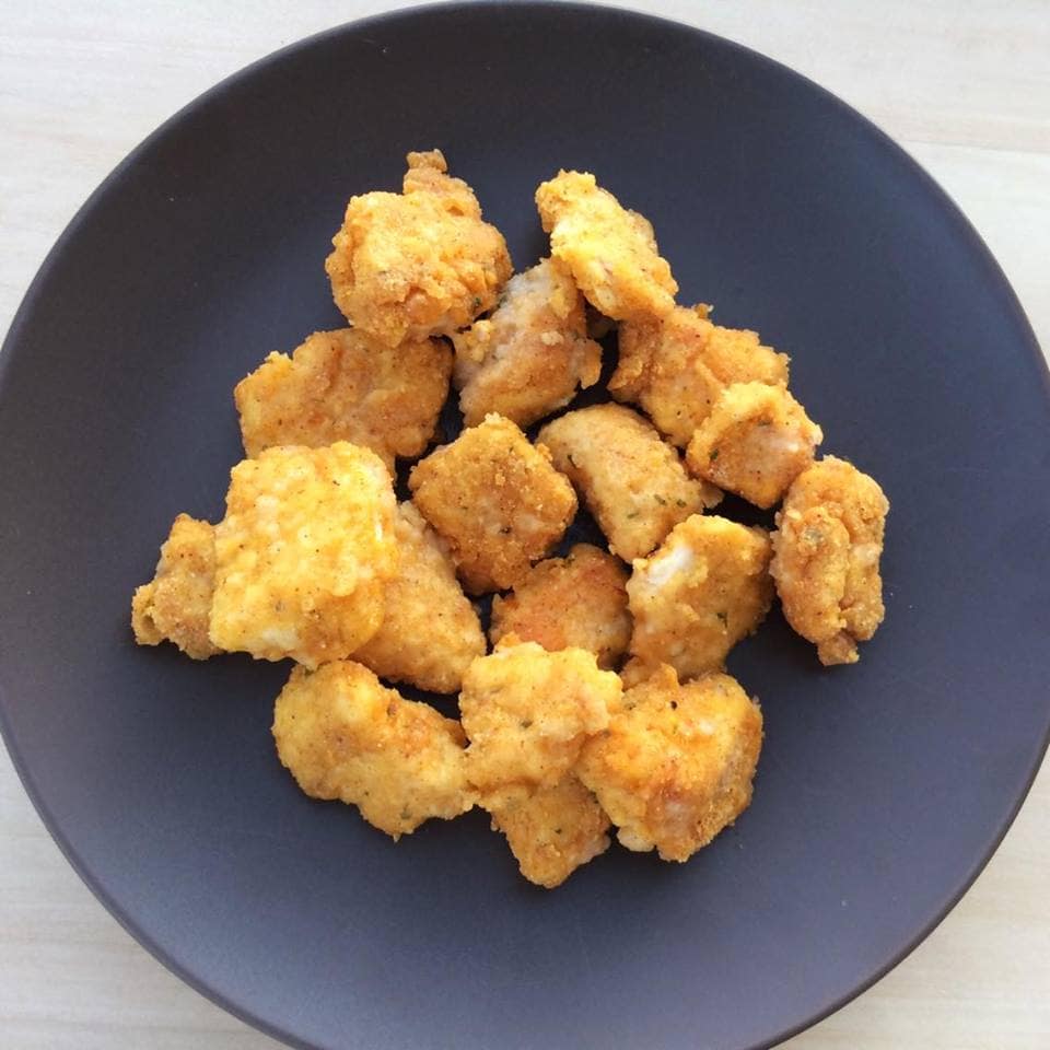 Oven Baked Popcorn Chicken on a plate.
