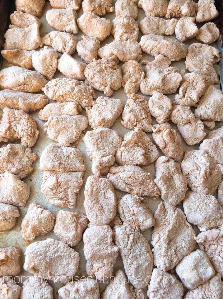 Step 3: Oven Fried Popcorn Chicken arranged on a baking sheet.