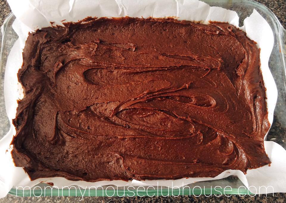 Brownie batter spread in a pan to make Thin Mint Brownies