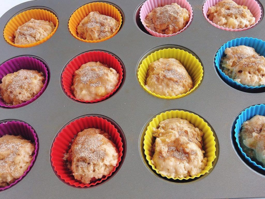 Cinnamon Swirl Banana Muffins in silicone wrappers.