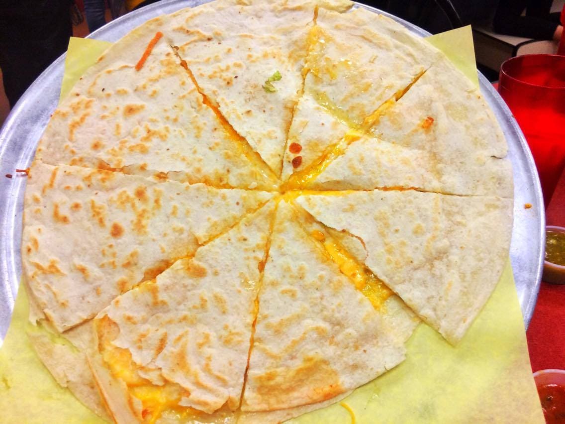 Hub cap sized Cheese Quesadilla from Los Sanchez