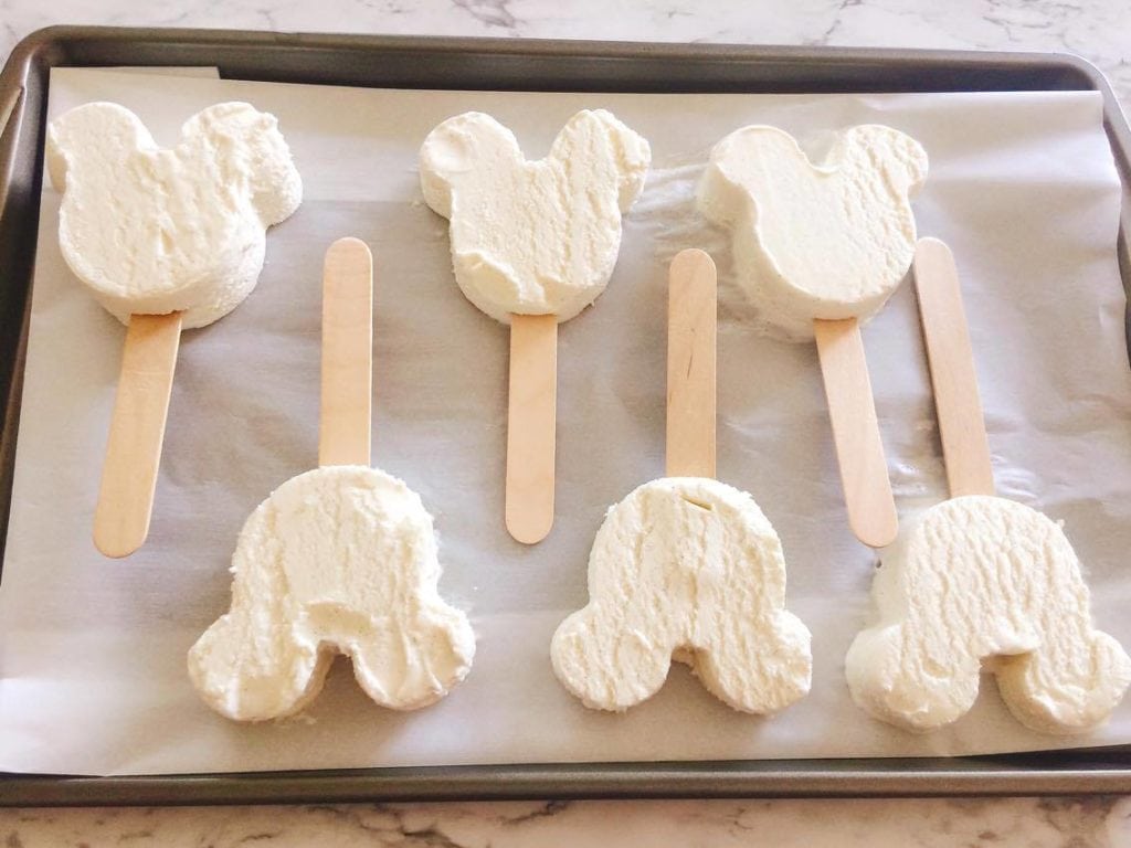 Vanilla Mickey Mouse Shaped Ice cream on a stick to make Homemade Hand Dipped Ice Cream Bars