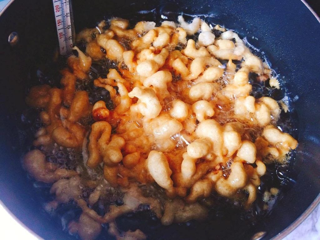 Disneyland's Apple Pie Funnel Cake being fried in oil