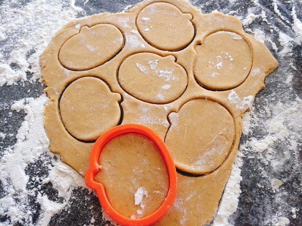 Pumpkin Spice Sugar Cookie dough and a pumpkin cookie cutter