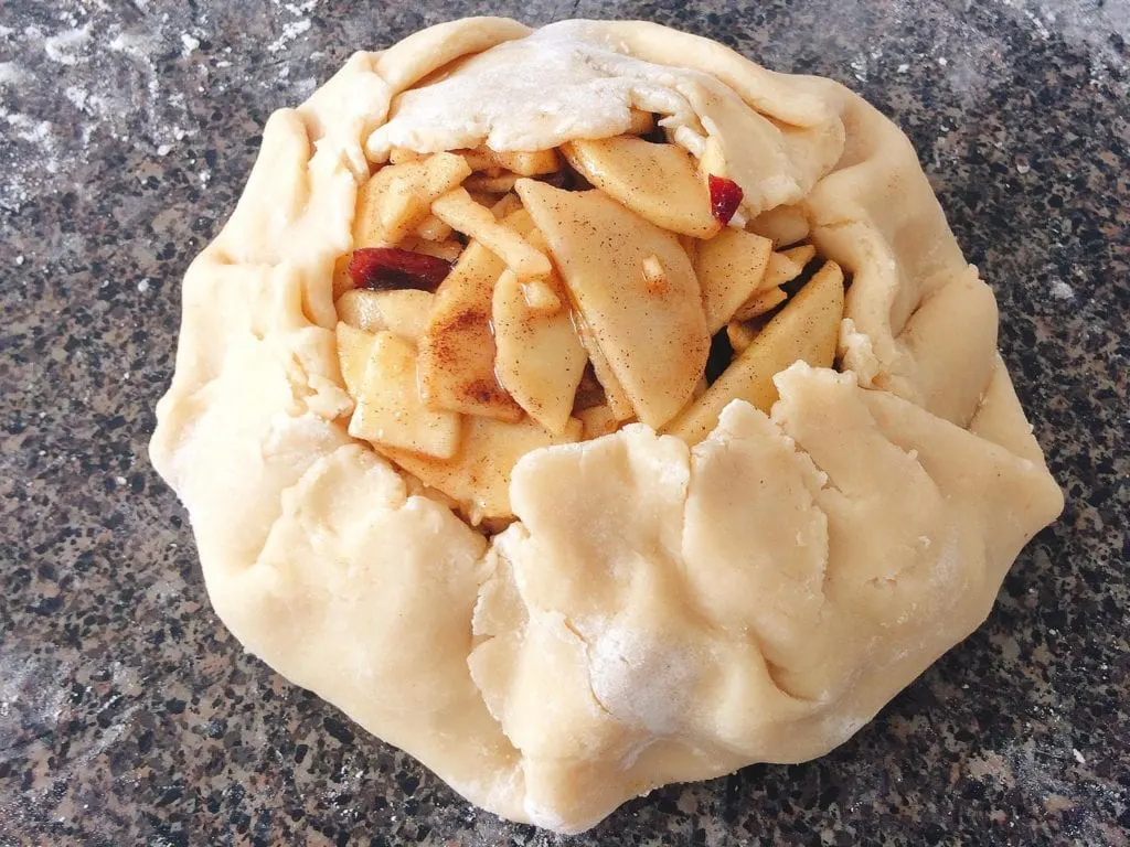 Rustic Apple Pie crust wrapped around pie filling