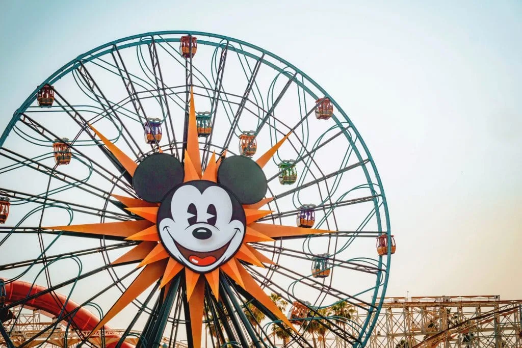 The face of Mickey Mouse on a large Ferris wheel called Pixar Pal-Around at Disneyland.