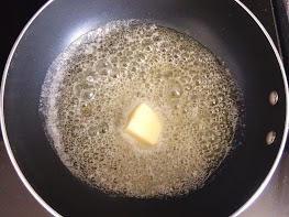 Butter melting in a pan for Leprechaun Rice Krispie Treats