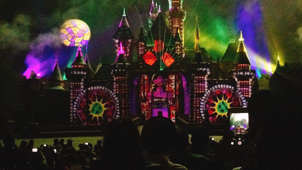 Sleeping Beauty's Castle lit up with fireworks at Disneyland.