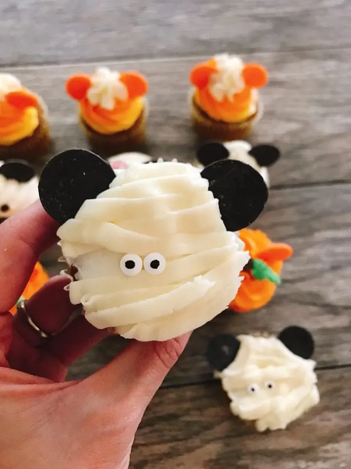 A close up of a Mickey Mouse Mummy Halloween Cupcakes.