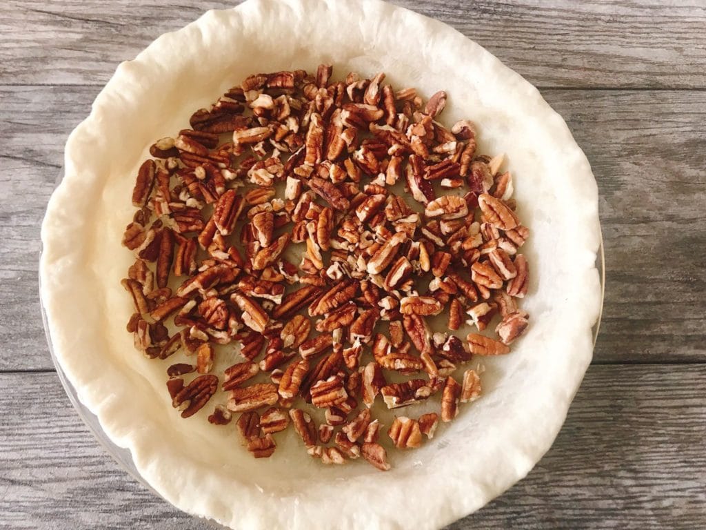 Pecans inside a pie shell to make Caramel Pecan Silk Pie.