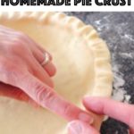 Text "Flaky Butter Homemade Pie Crust" over a picture of two hands shaping pie crust.