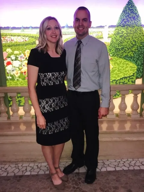 A man and woman dressed up for formal night on a Disney Cruise.