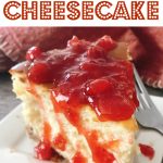 Text “Perfect New York Cheesecake” over a picture of cheesecake topped with strawberry sauce.