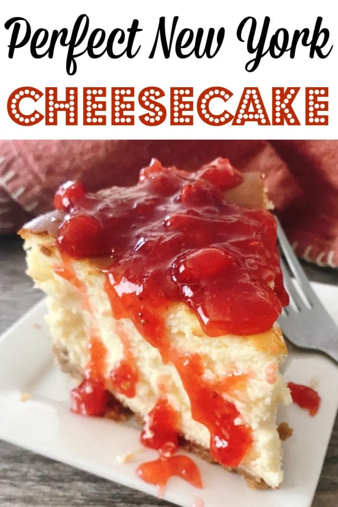 Text “Perfect New York Cheesecake” over a picture of cheesecake topped with strawberry sauce.