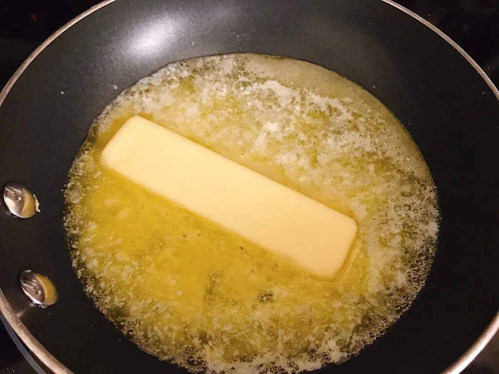 Butter melting in a pan.