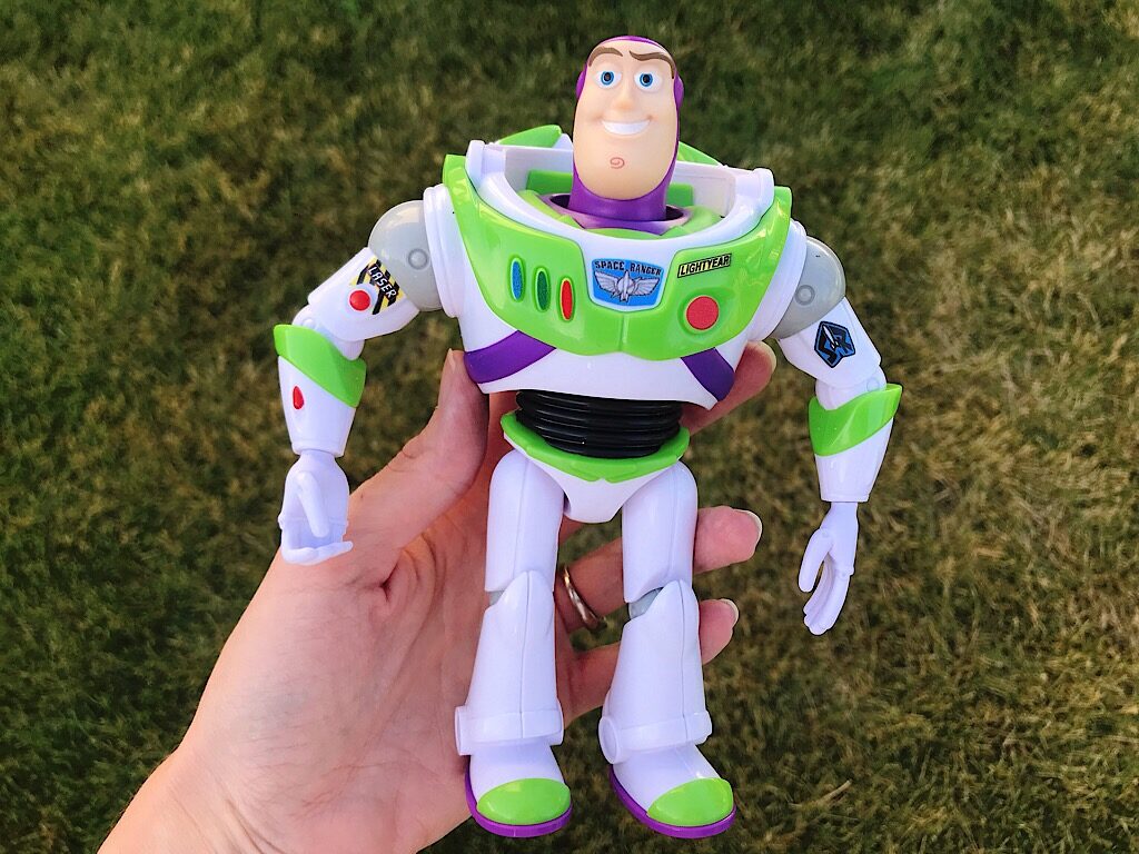 A toy of the character Buzz Lightyear from the movie Toy Story 4