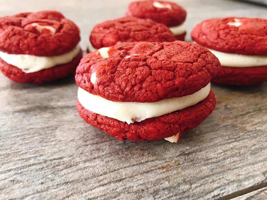 Red Velvet Cake Mix Sandwich cookies with cream cheese filling.