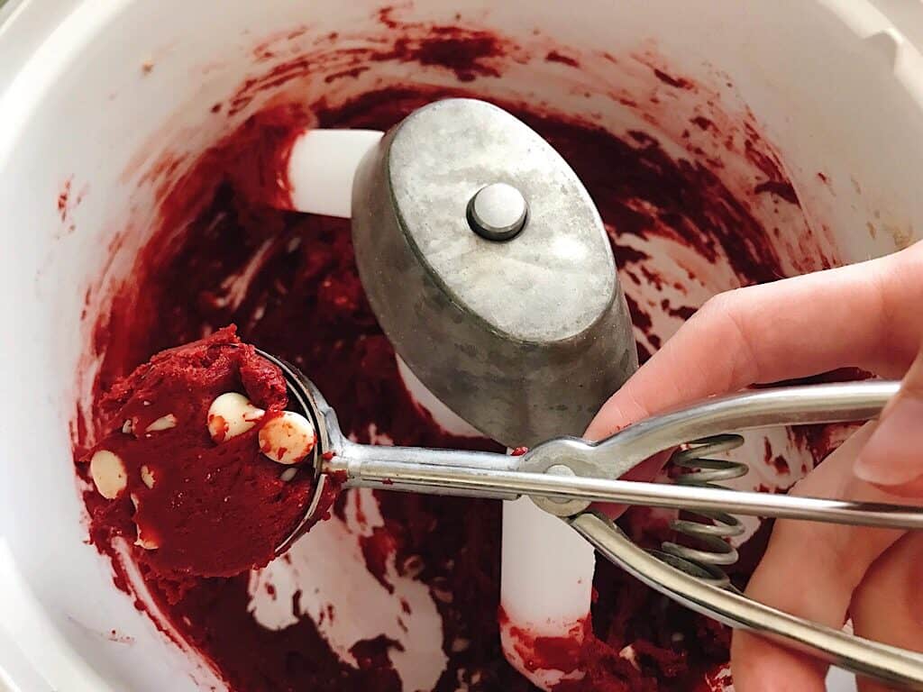 A scoop of red velvet cake mix cookie dough
