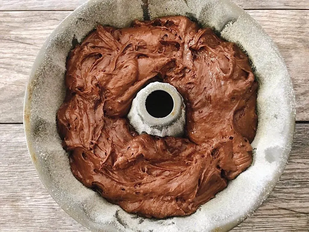 Chocolate cake batter in a bundt pan