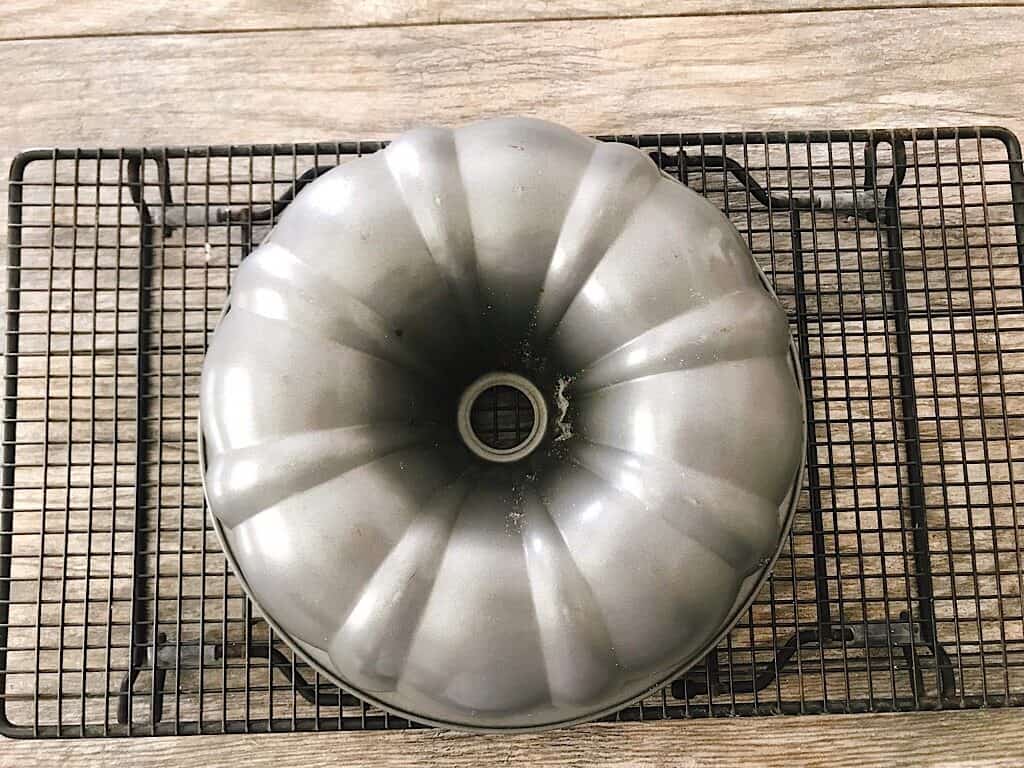 Bundt pan on a cooling rack