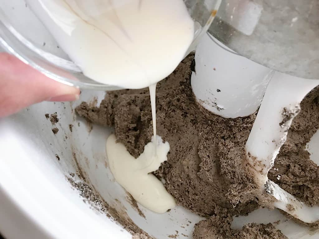 Cream poured into OREO macaron filling