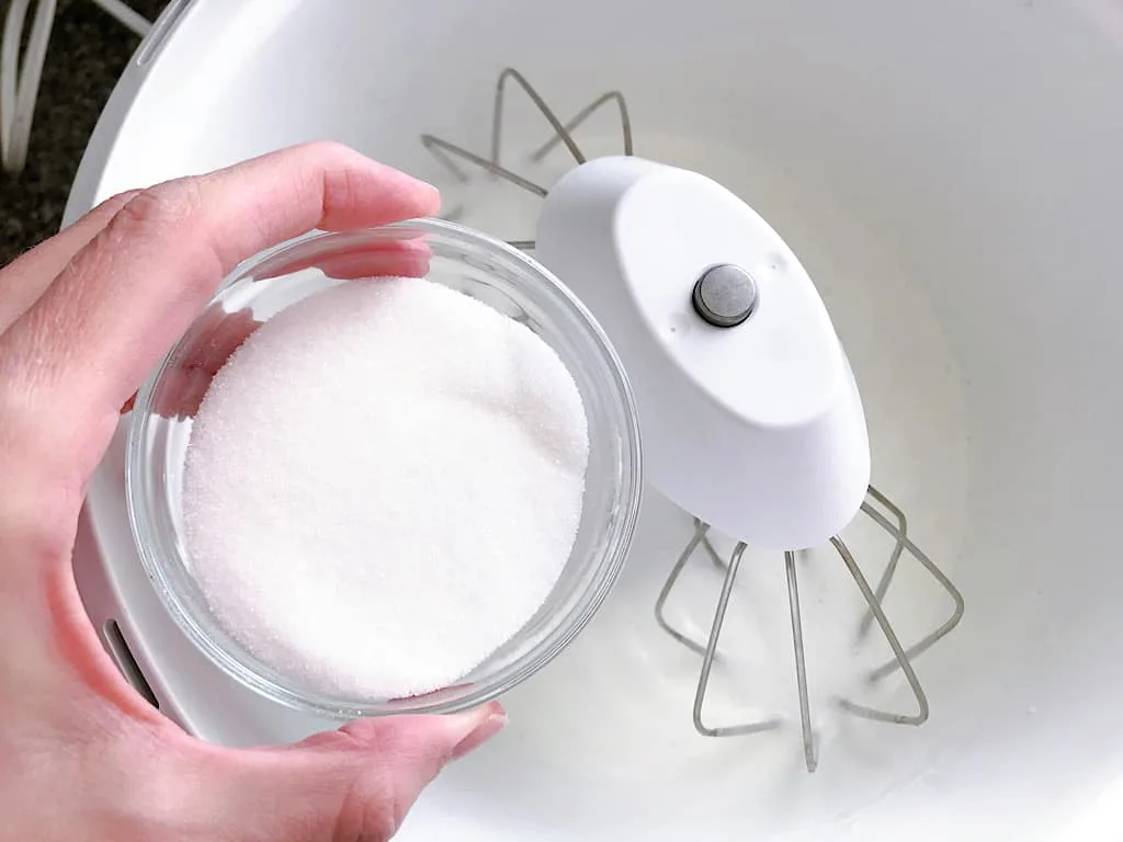Sugar and egg whites in a stand mixer