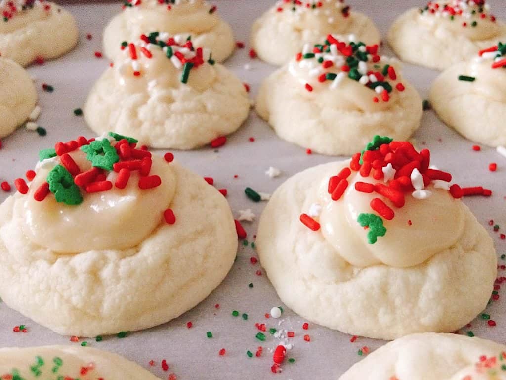 A Melt Away Christmas Cookie with Red and Green Sprinkles