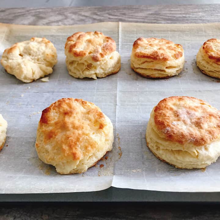 Honey Buttermilk Biscuits cooling on a baking sheet