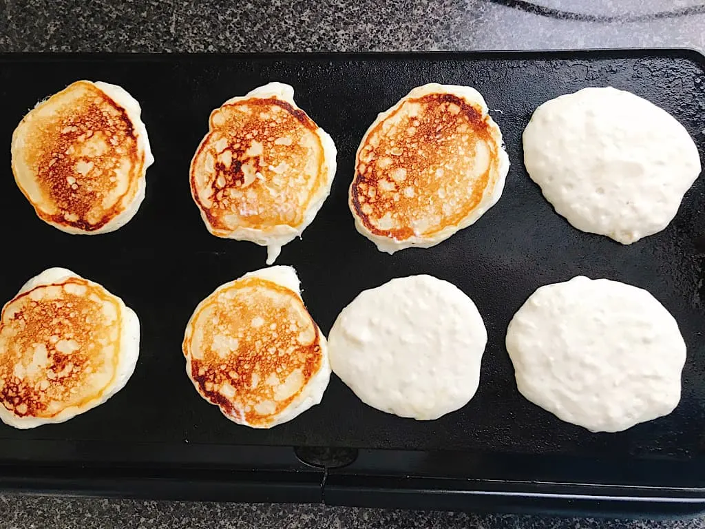 Buttermilk pancakes on a griddle