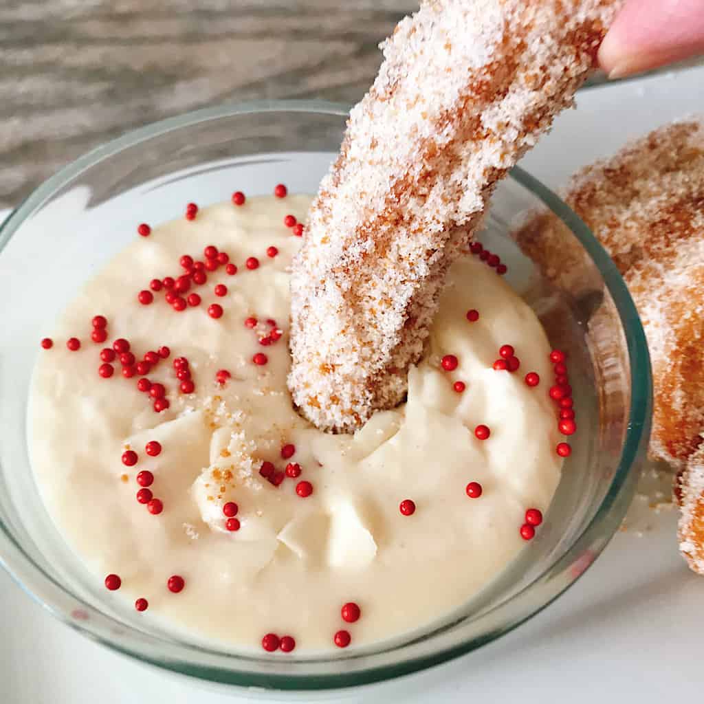 Cookie Butter churros in sweet milk dipping sauce