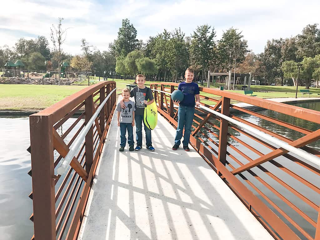 Boys on a bridge atRalph B Clark Regional Park