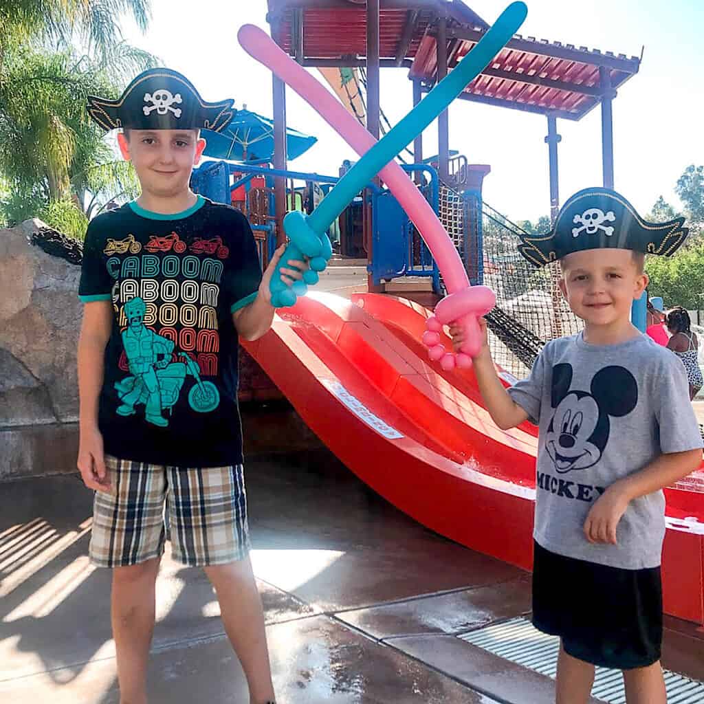 Two kids at the water playground of Howard Johnson Anahiem.