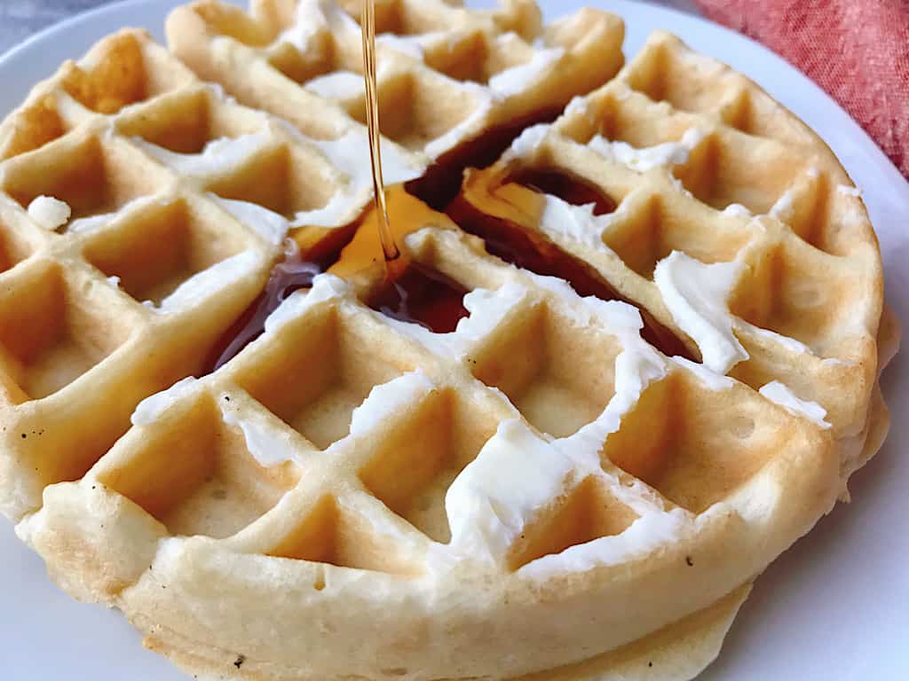 Syrup poured on an easy fast waffle.