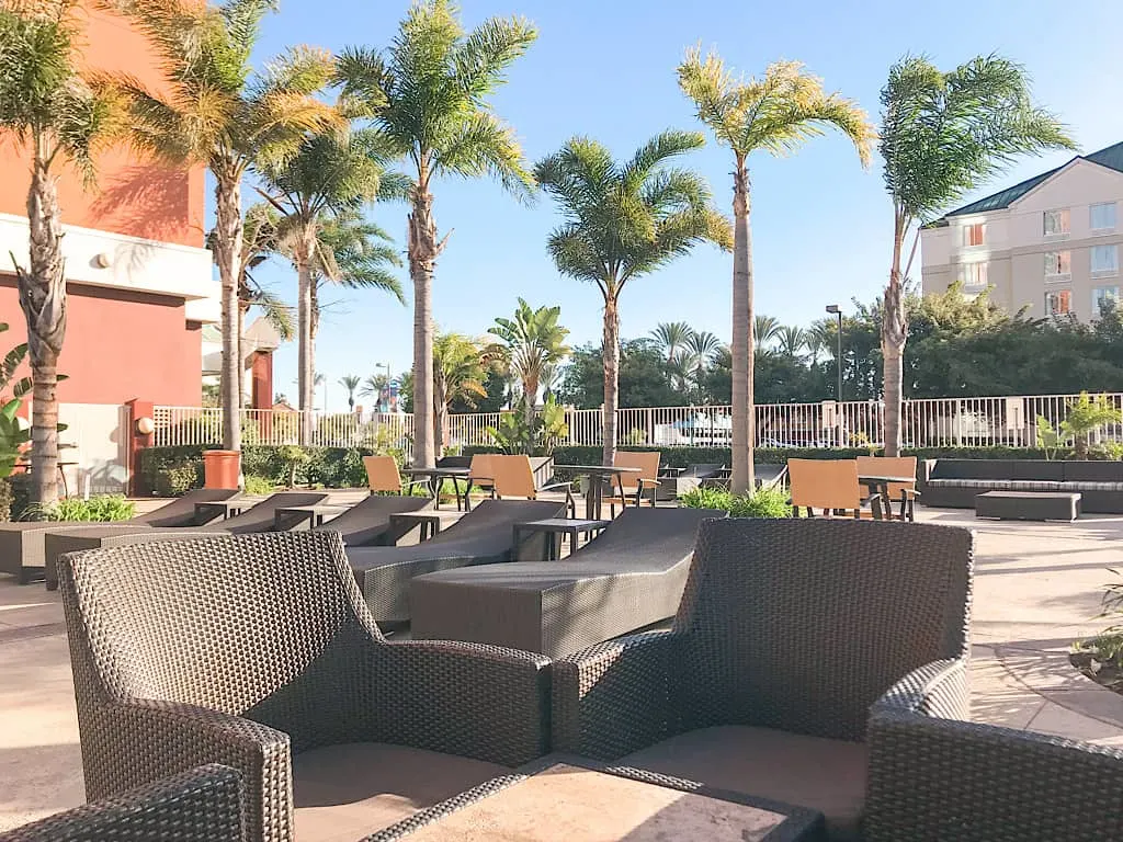 Outdoor seating area at Embassy Suites by Disneyland