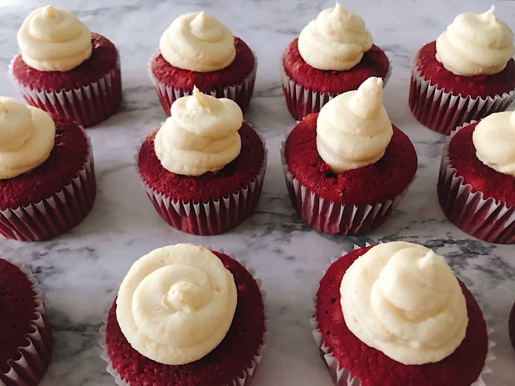 Red velvet cupcakes filled with cheesecake