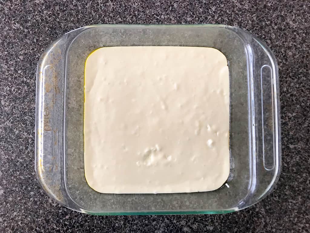 Cheesecake batter in an 8x8 pan