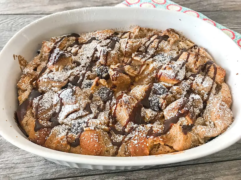 French Toast Bake with hot fudge and powdered sugar