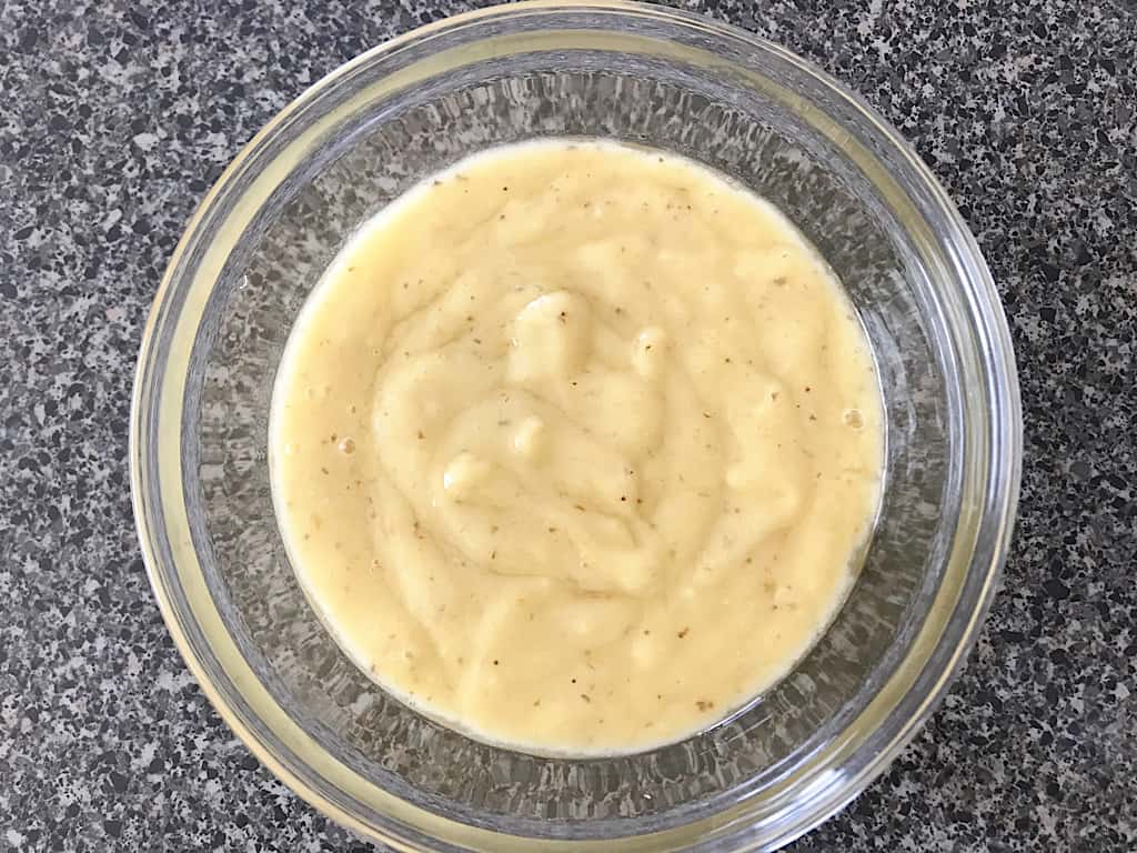 A bowl of mashed bananas.