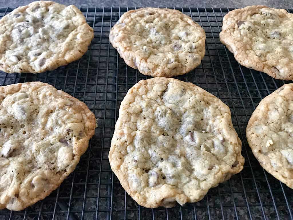 Chocolate chip cookies cooling on a cooling rack