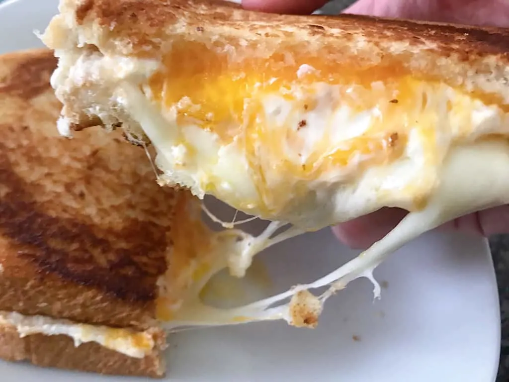 Cheese oozing out of a Toy Story Grilled Cheese