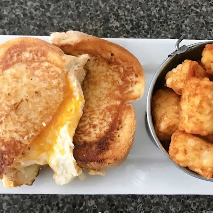 Woody's Lunchbox three cheese grilled cheese and tater tots