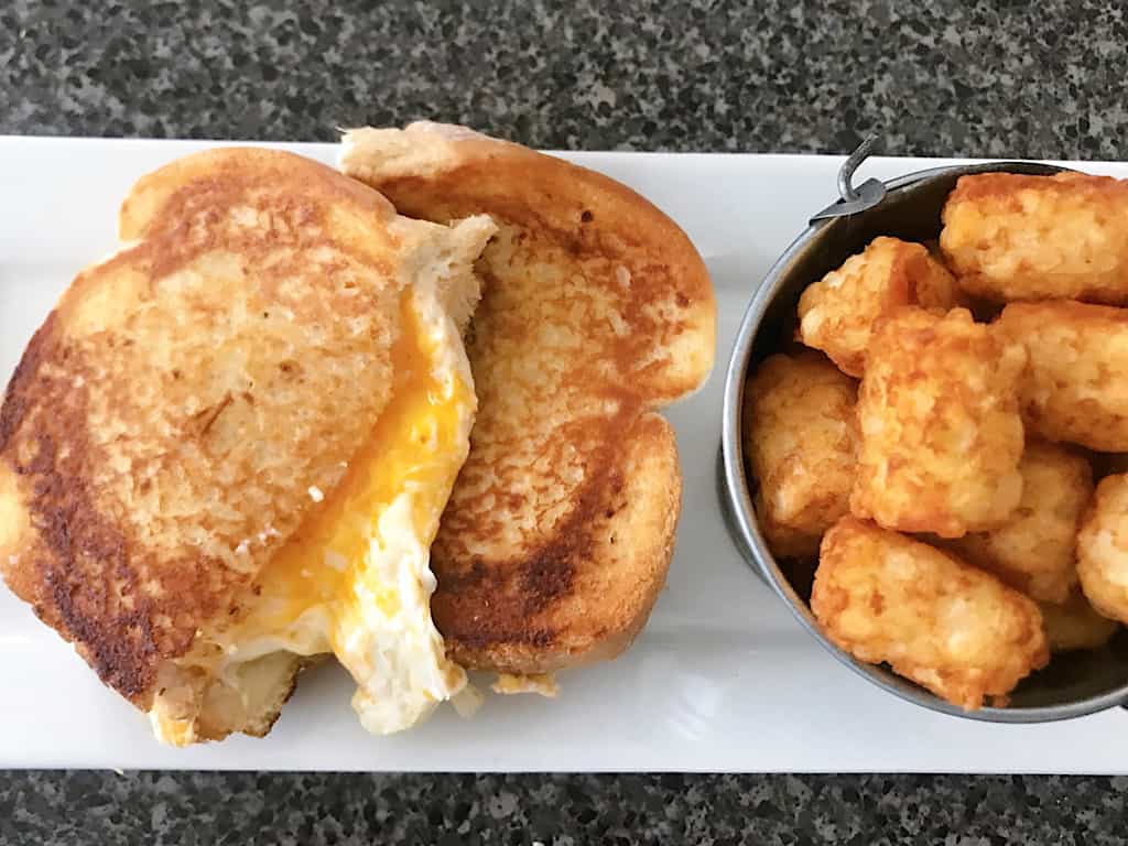 Woody's Lunchbox three cheese grilled cheese and tater tots