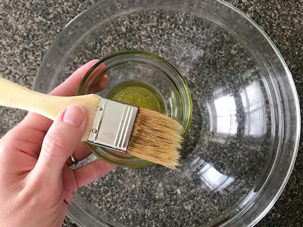 Spray a large mixing bowl with cooking spray or coat in oil.