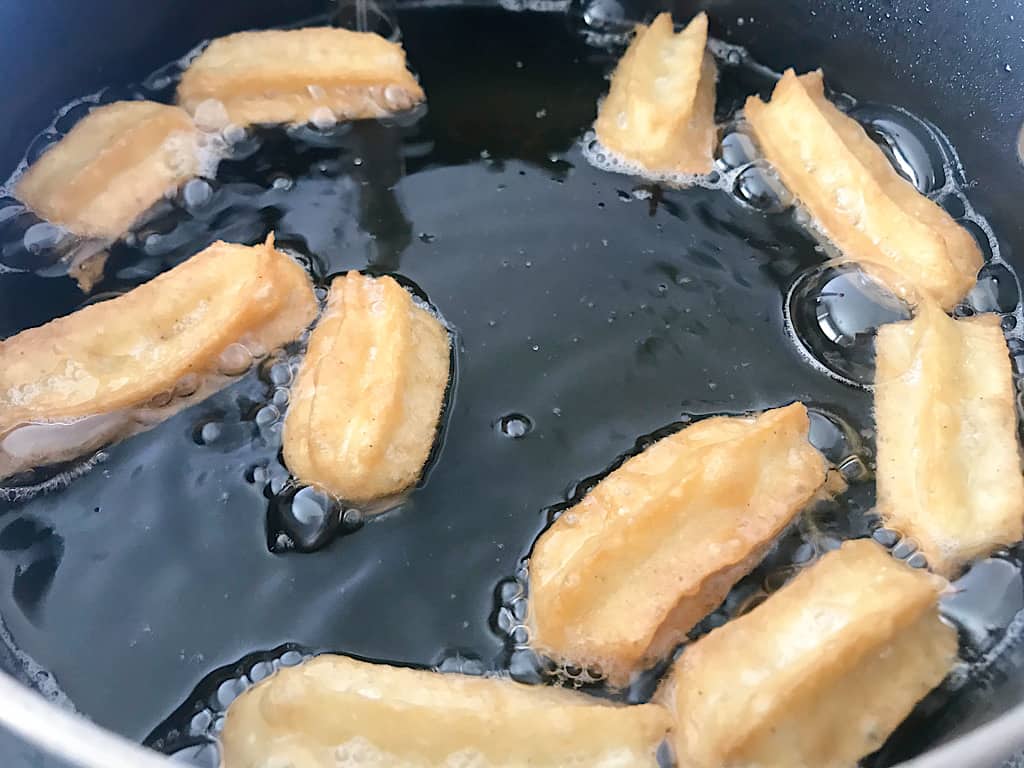 Mini Disney Churro bites frying in oil