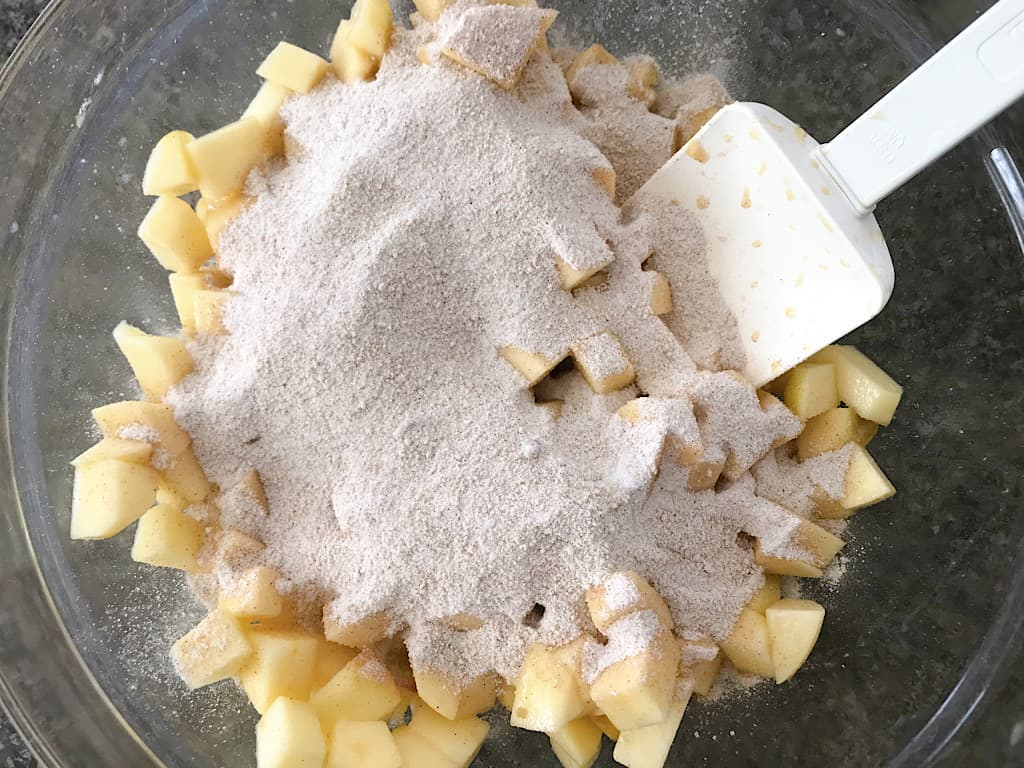 Sugar, brown sugar, flour and apples to make apple pie filling