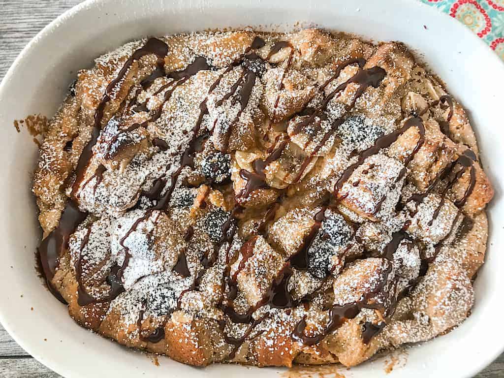 Chocolate Peanut Butter Banana French Toast Bake in a white dish
