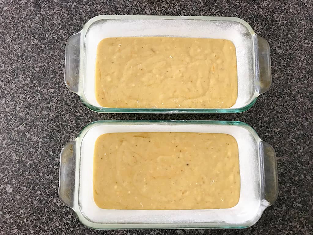 Banana bread batter in two loaf pans