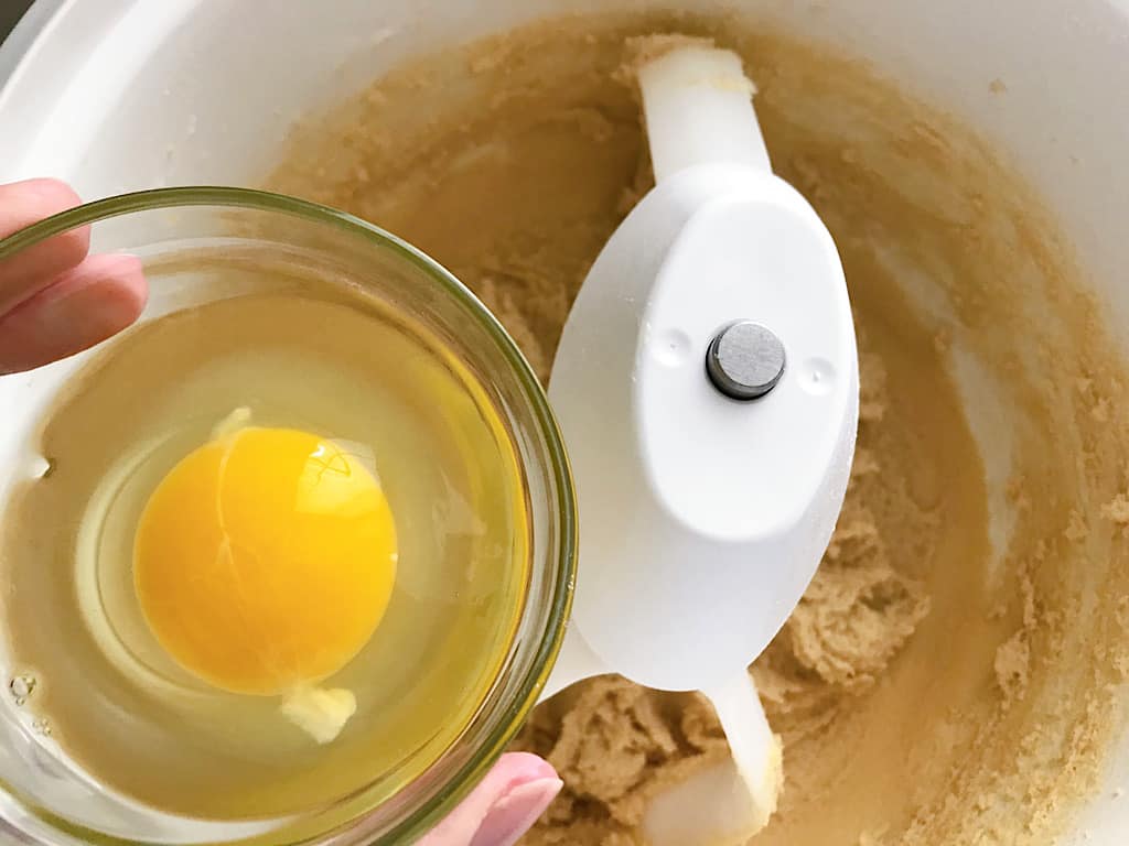 Beat in the eggs one at a time, then mix in the vanilla.