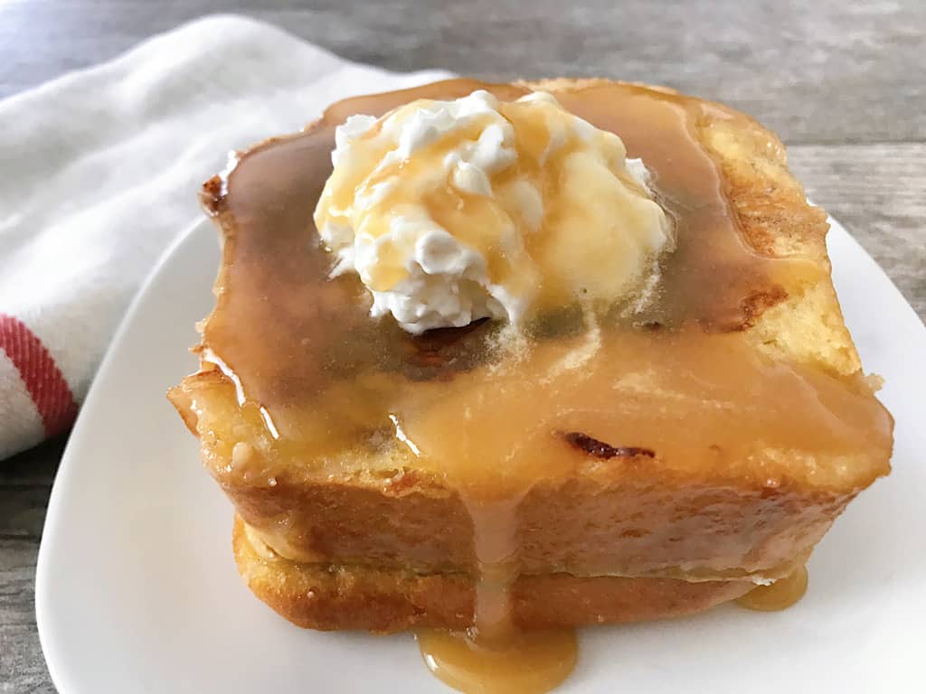 Kneader's French Toast with whipped cream and caramel syrup