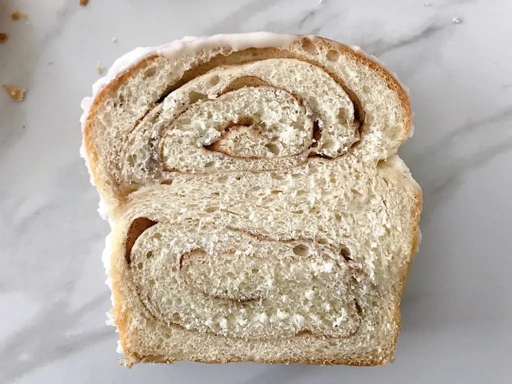 A slice of chunky cinnamon bread like Kneader's